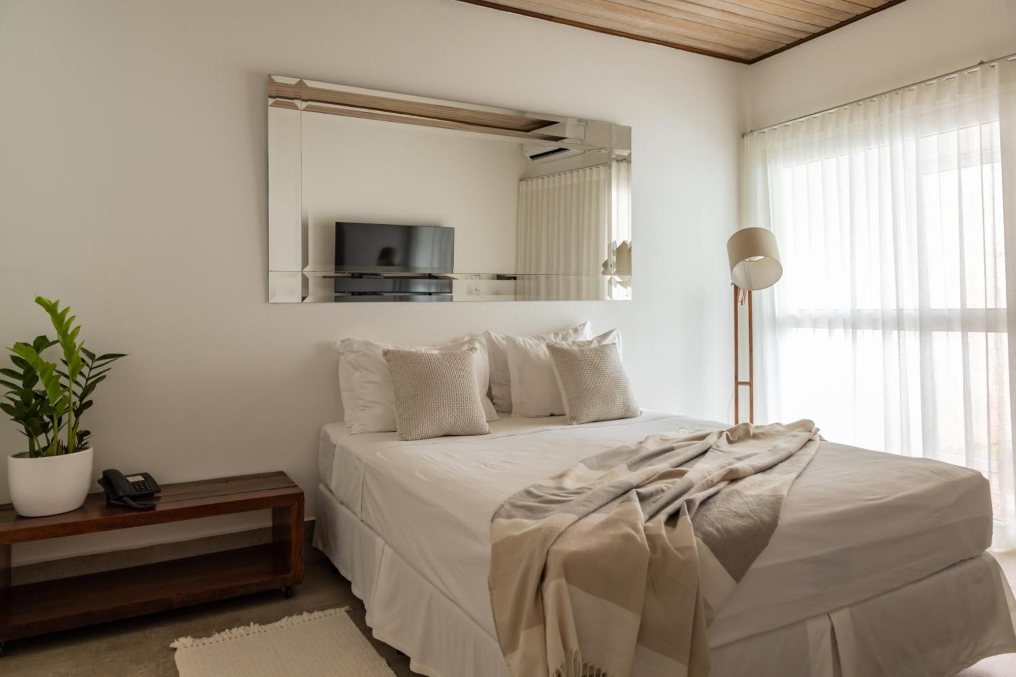 Hotel Boutique Frangipani Brotas Buitenkant foto A bedroom