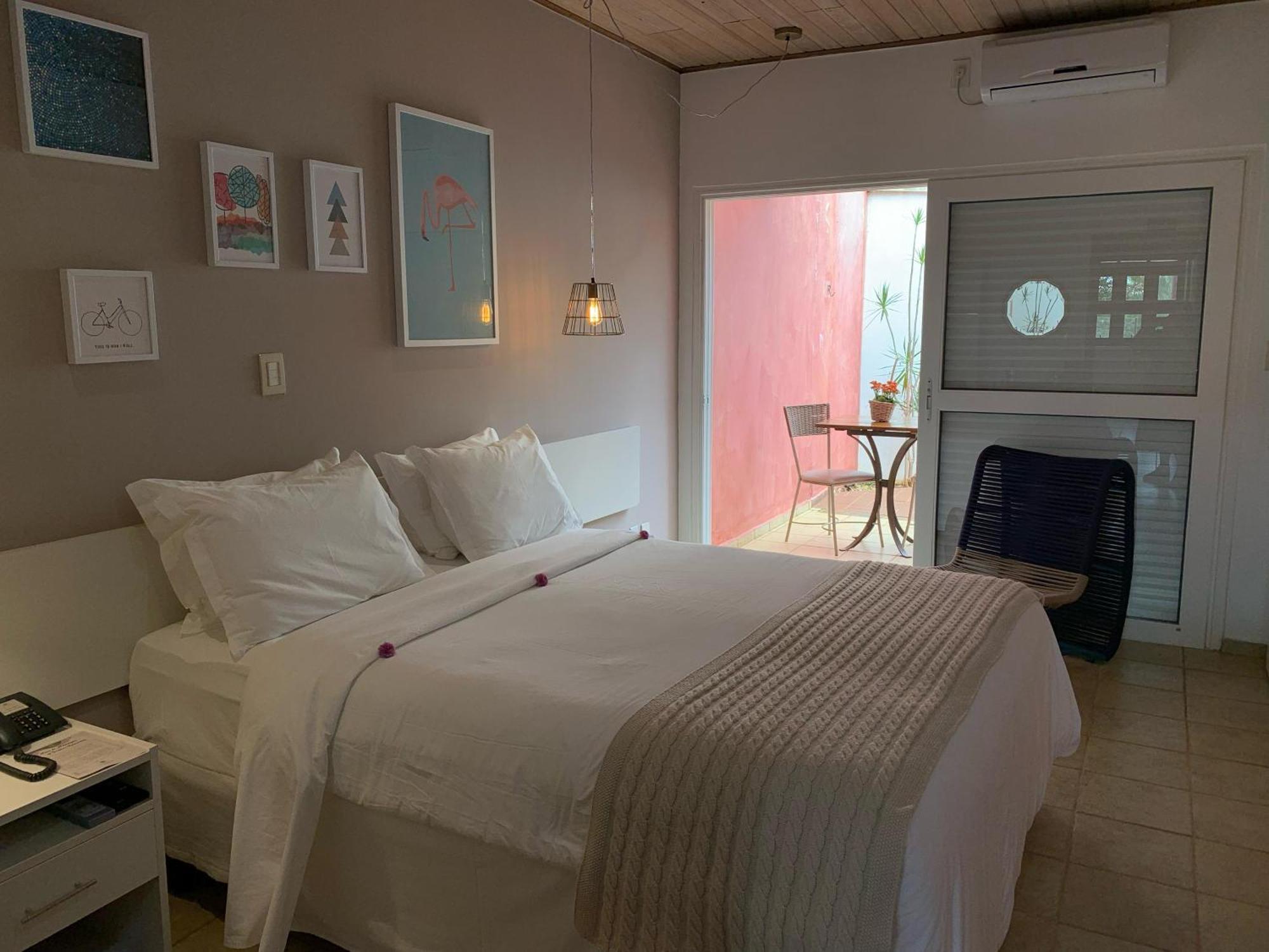 Hotel Boutique Frangipani Brotas Buitenkant foto A room at the hotel